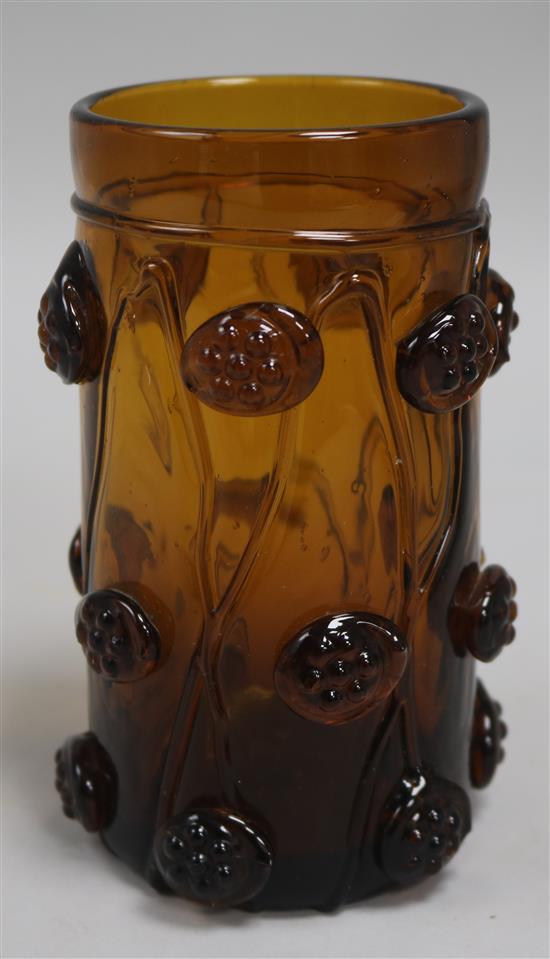 A Rheinish amber glass humpen, decorated with raspberry prunts, 5.75in.